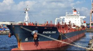 The Suezmax tanker Shenlong berths at Mumbai Port on Thursday, becoming the first major crude carrier to navigate the Strait of Hormuz since the conflict began.